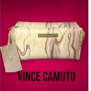 Vince Camuto makeup bag. New w tags. White coated canvas.
